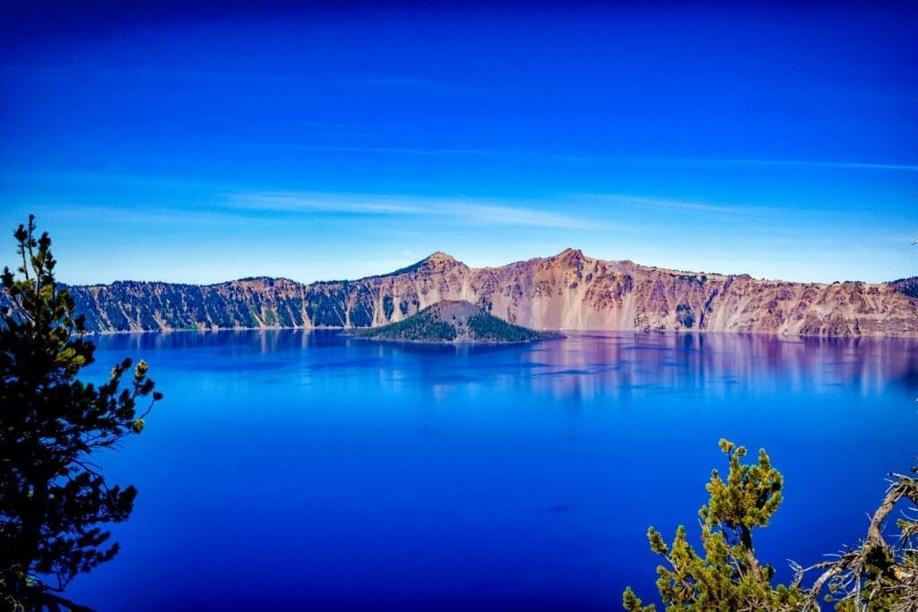 Blue Lake made in a crater with an island in the middle